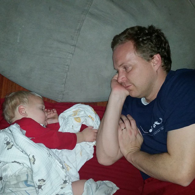 Sick Dad Snuggling Sleeping Baby